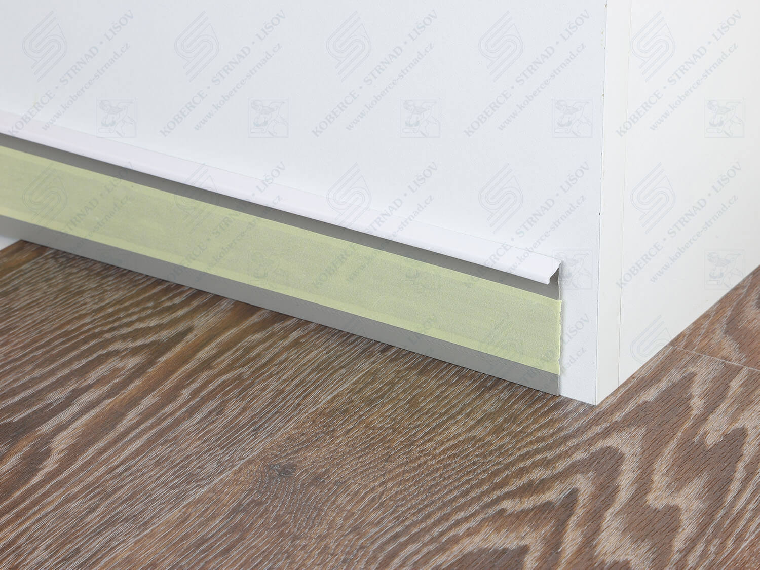 Kobercová lišta TLE 55K 117 bílá