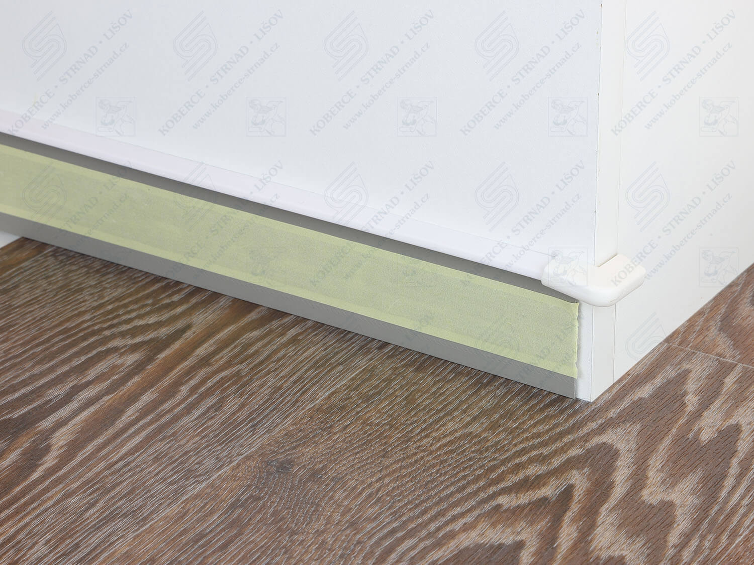 Kobercová lišta TLE 55K 117 bílá