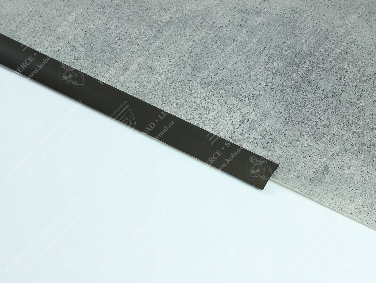 Oblouk 30 mm tmavý bronz Küberit přechodová lišta samolepící 21559060-65