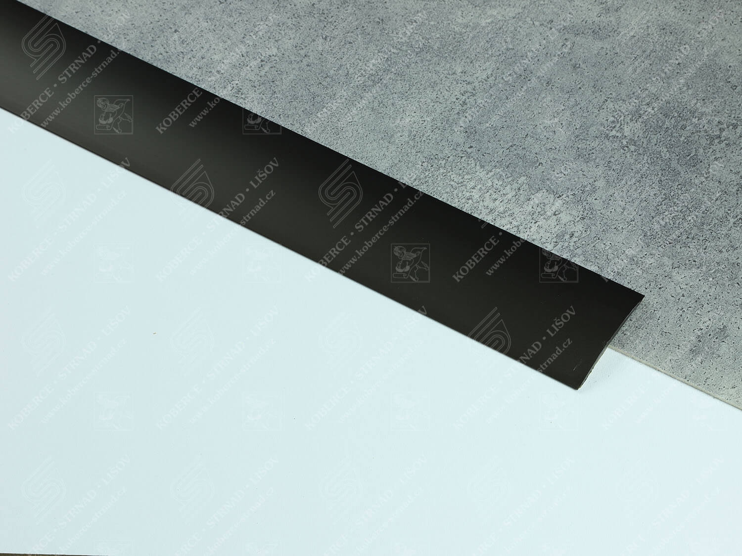 Oblouk 60 mm tmavý bronz Küberit přechodová lišta samolepící