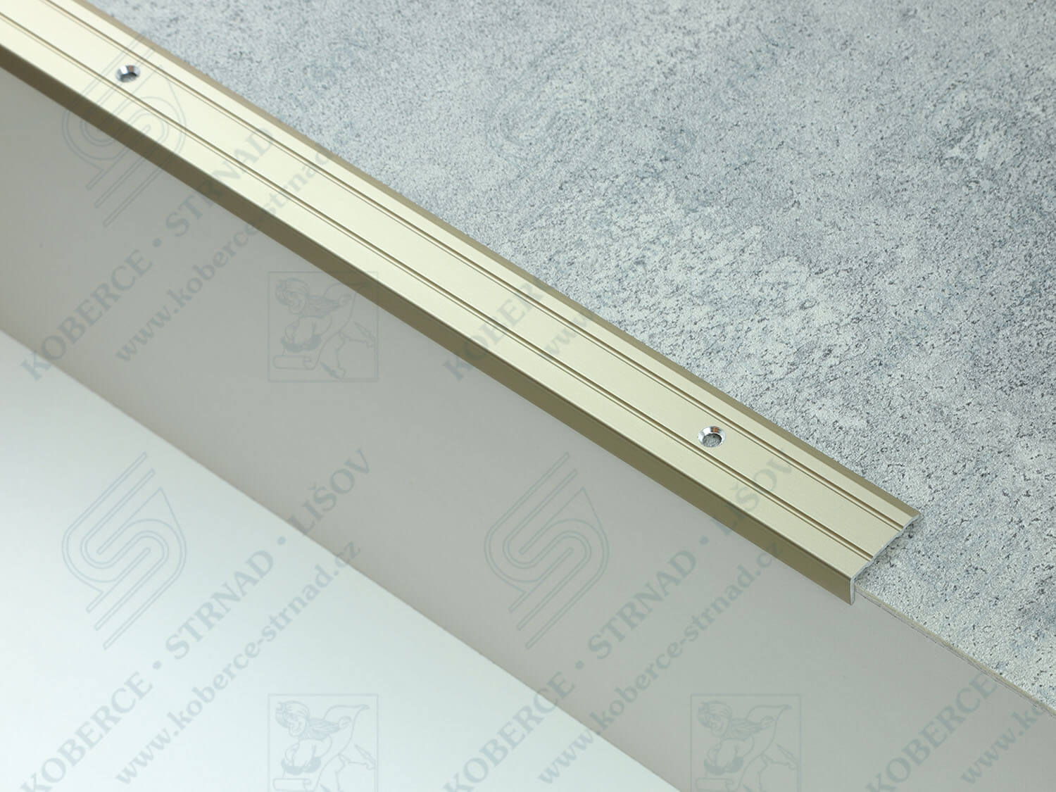 Schodová hrana 24,5x10 mm světlý bronz vrtaná