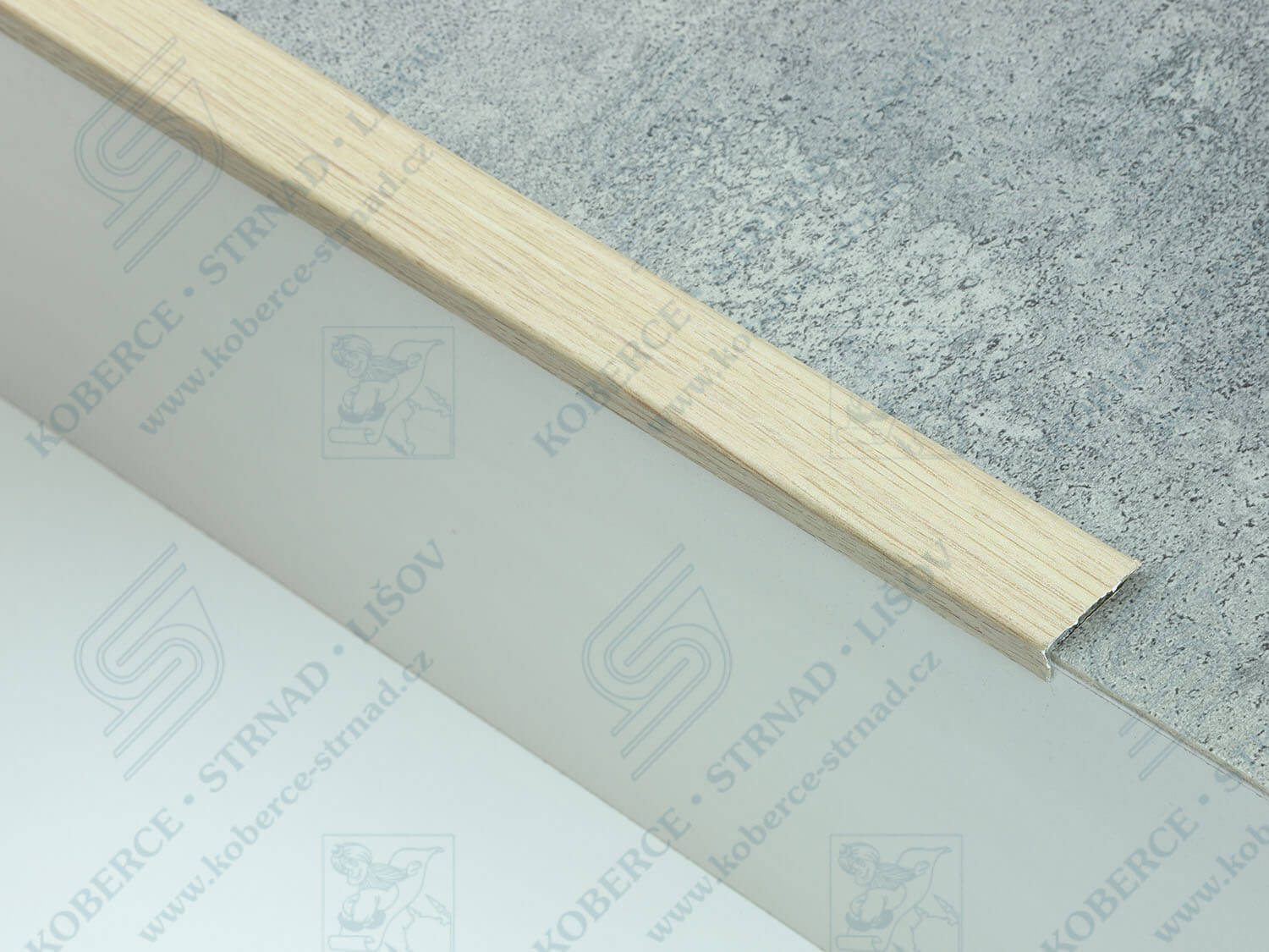Schodová hrana 24,5x10 mm H33 dub bělený
