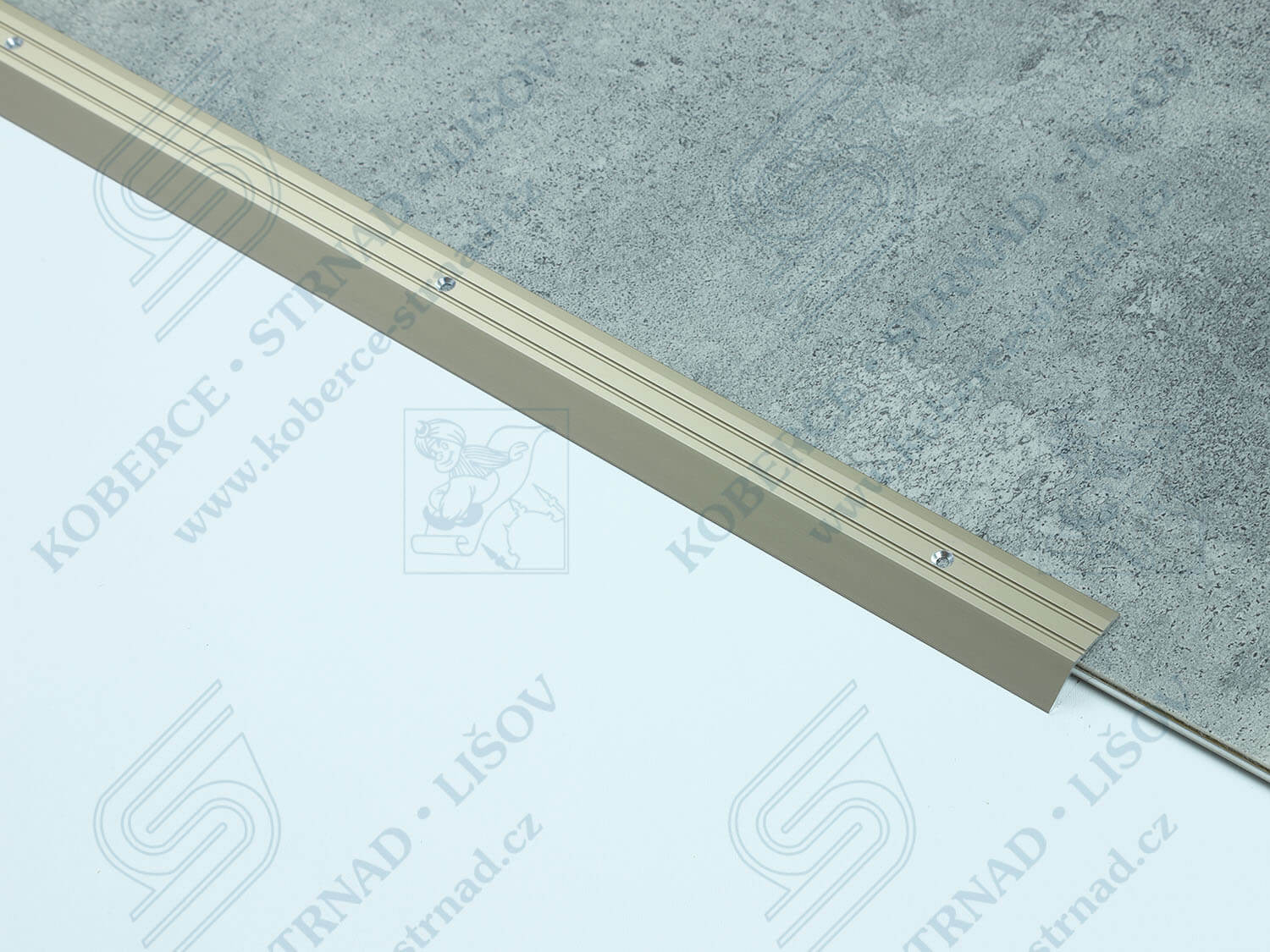 Náběh 8,5 mm světlý bronz podlahová lišta vrtaná