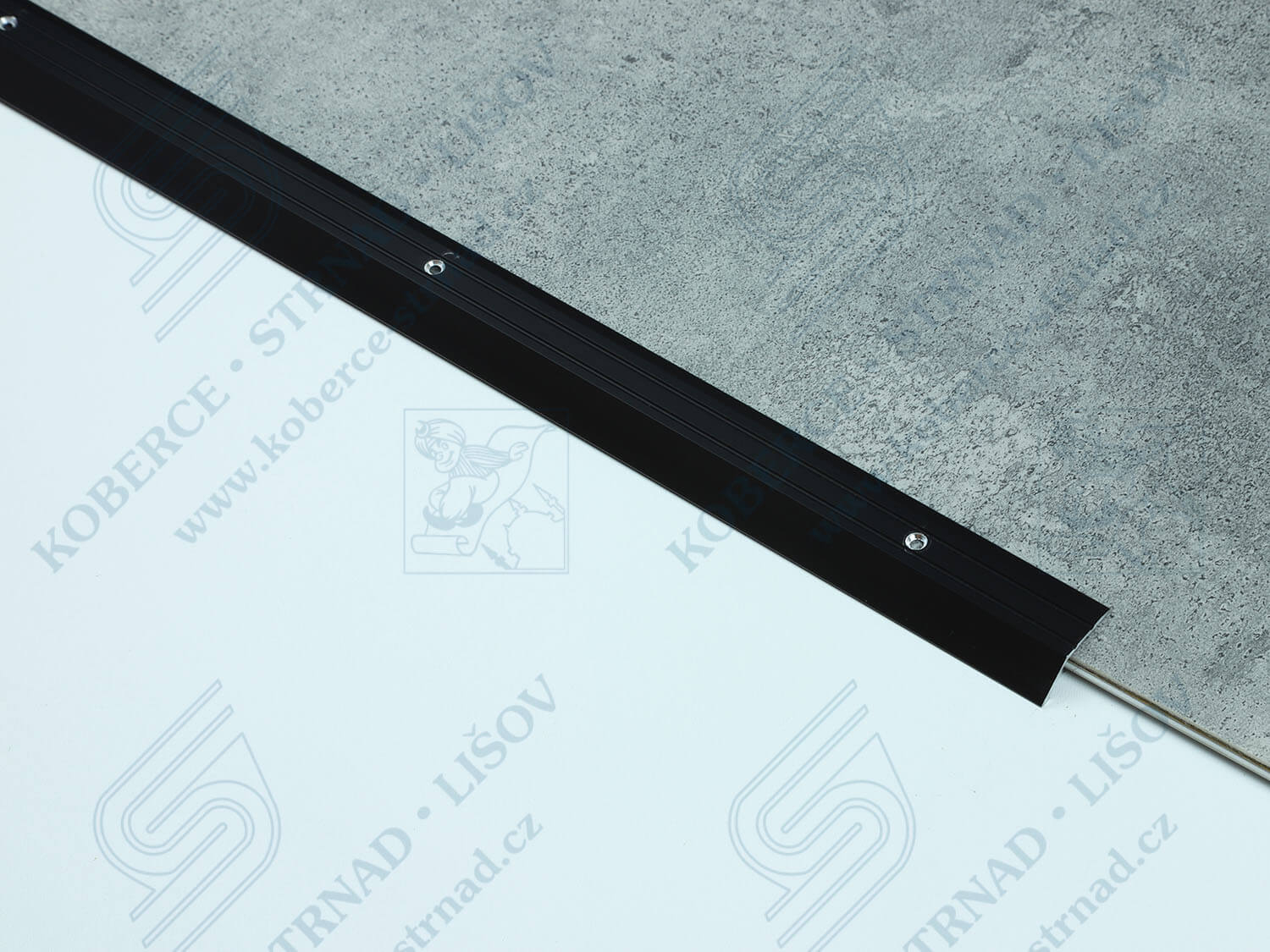 Náběh 8,5 mm tmavý bronz podlahová lišta vrtaná